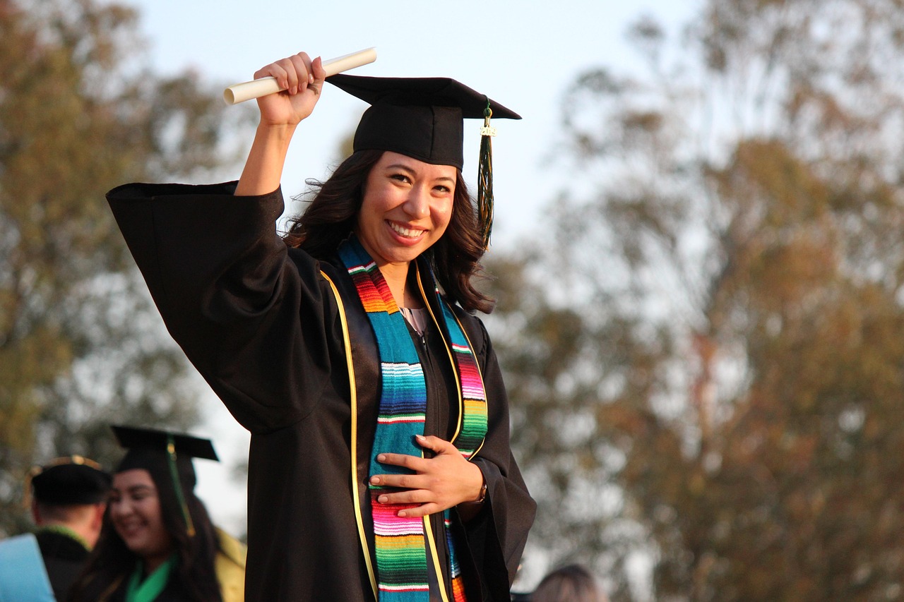 High school students celebrating graduation, ready for college